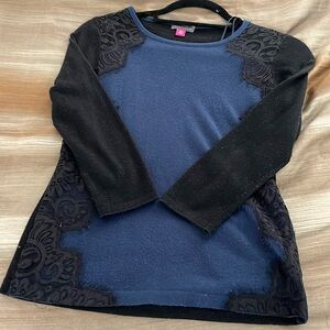 Vince Camuto navy seater with black lace trim.